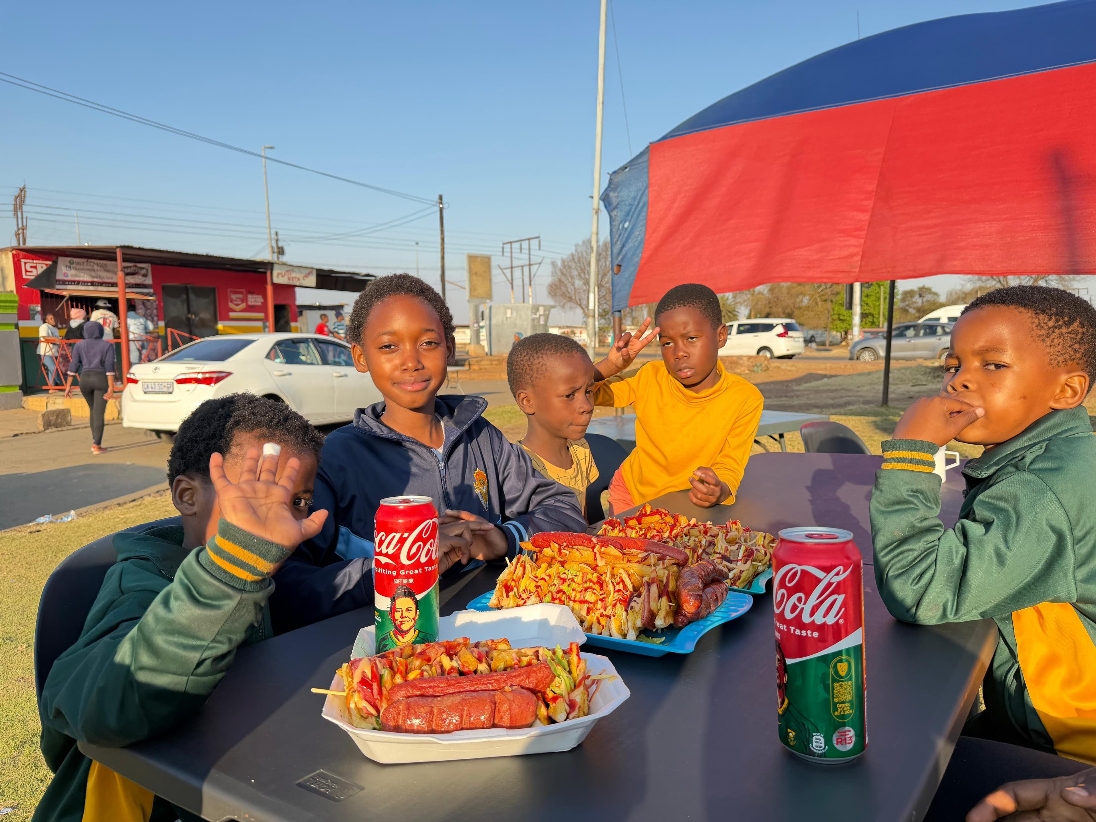 Children enjoying food from Vhadzanani Kitchen