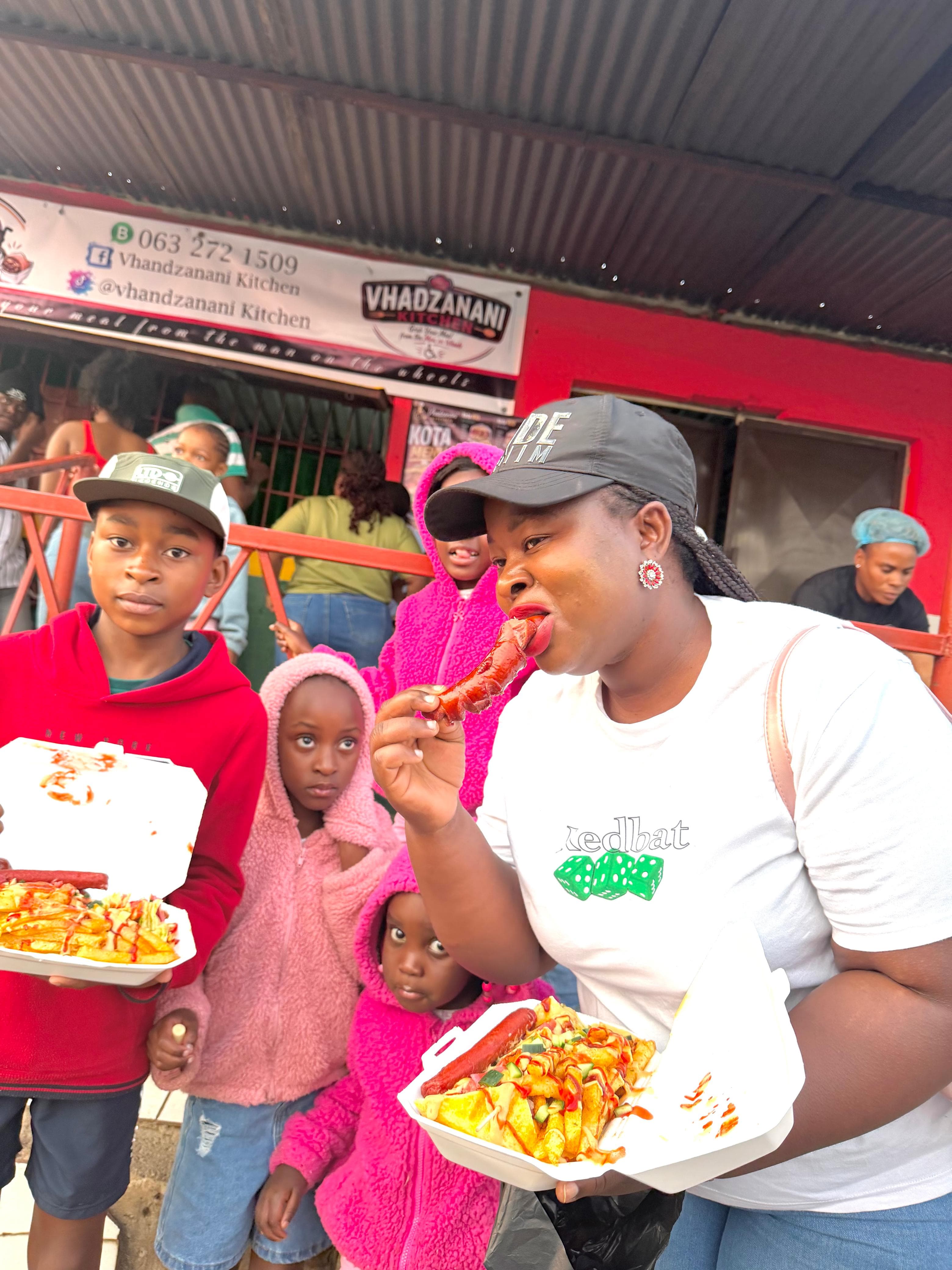 Customers enjoying food outside Vhadzanani Kitchen