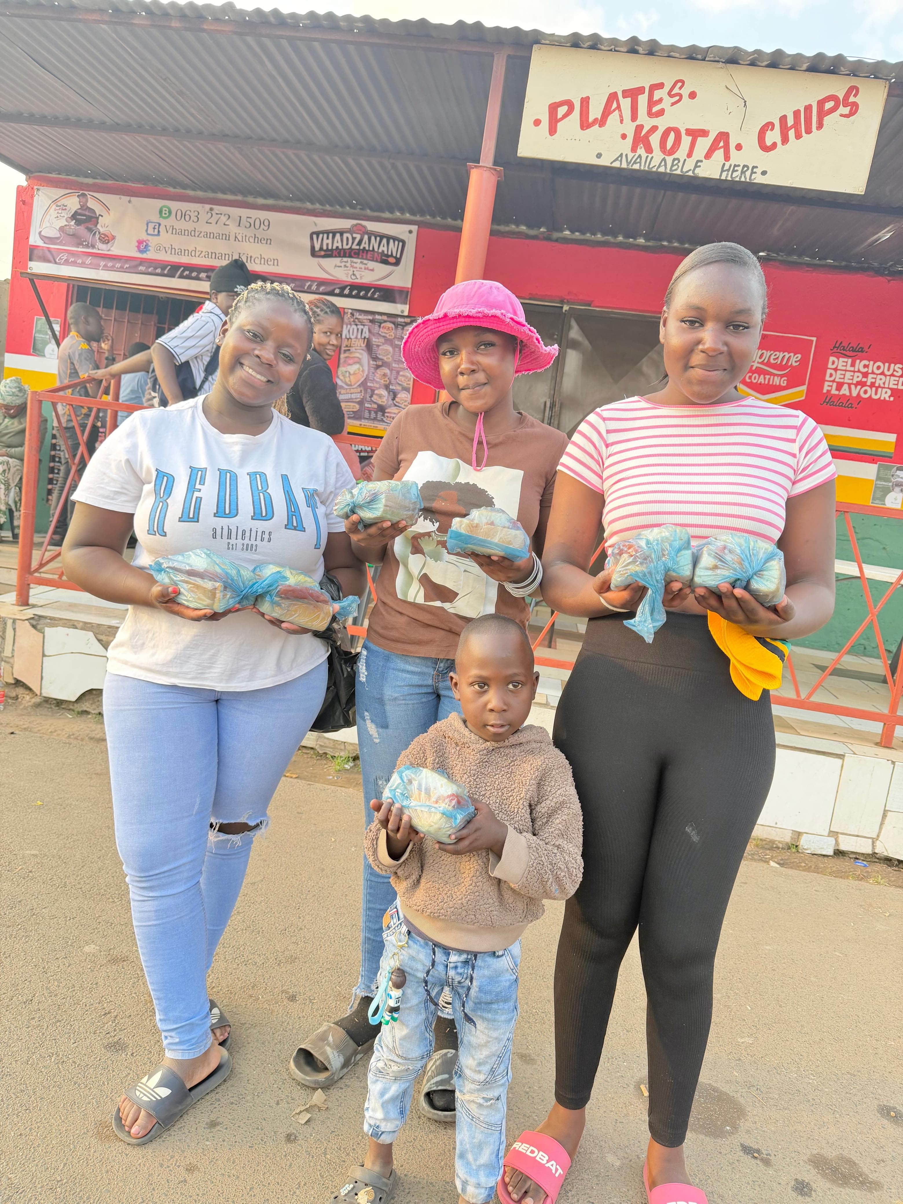 Local customers outside Vhadzanani Kitchen